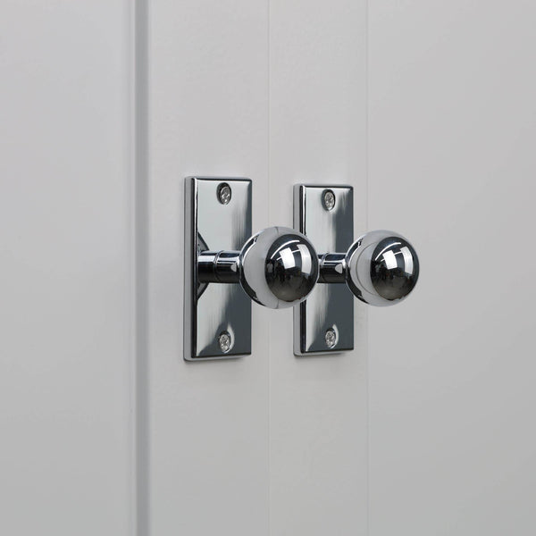 Cabinet detail in polished chrome