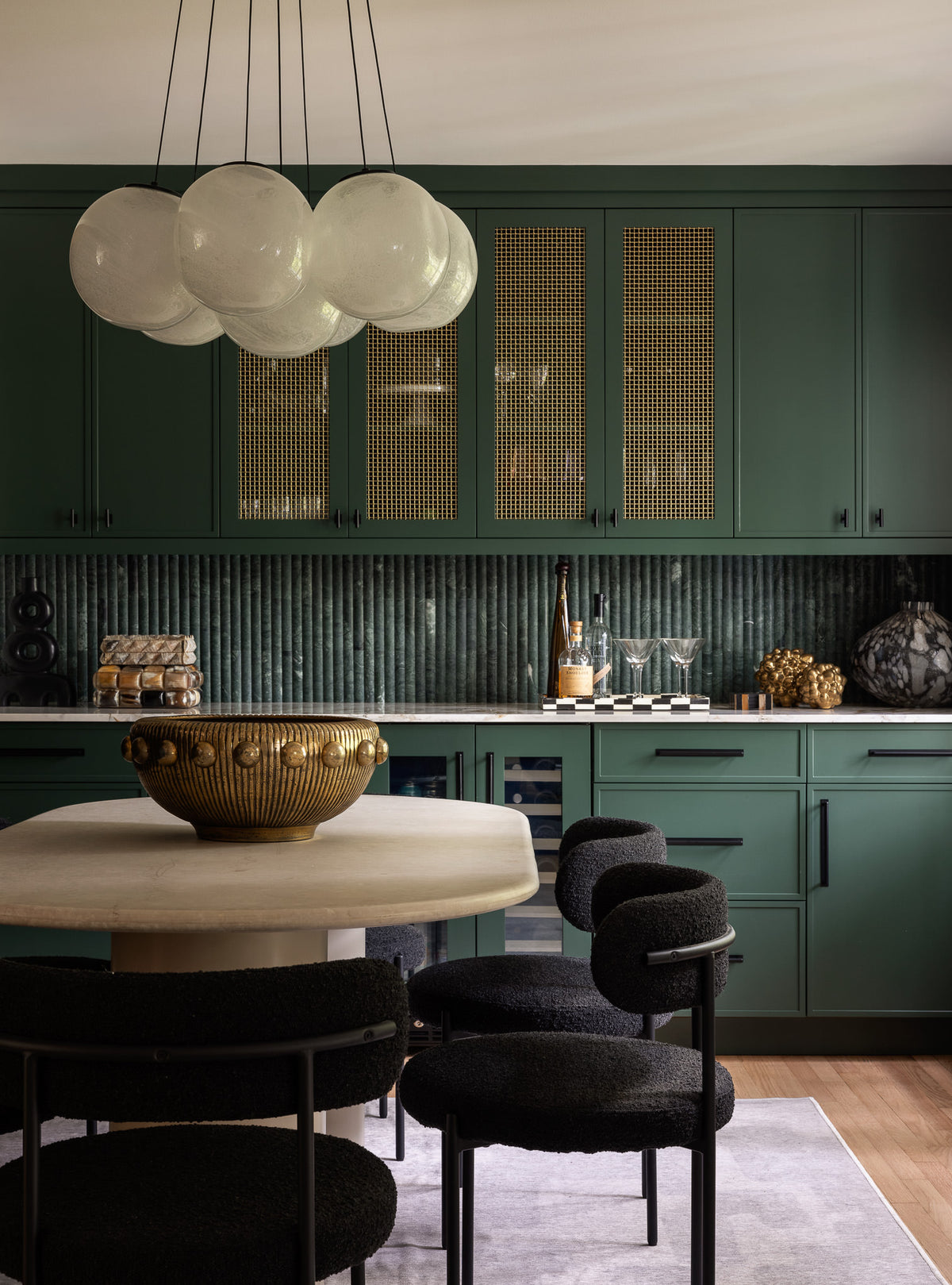 Column pull handles in matte black made with solid brass on cabinet doors
